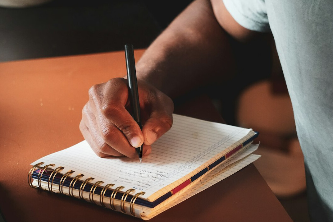 person journaling thoughts