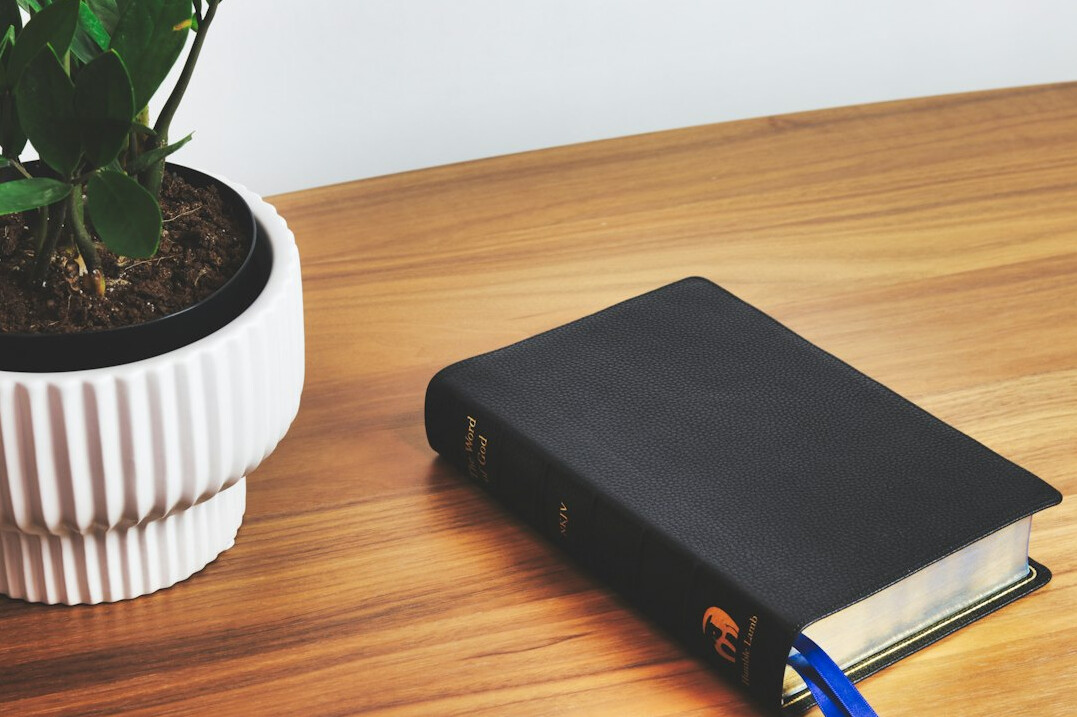 Notebook and pen on a wooden table
