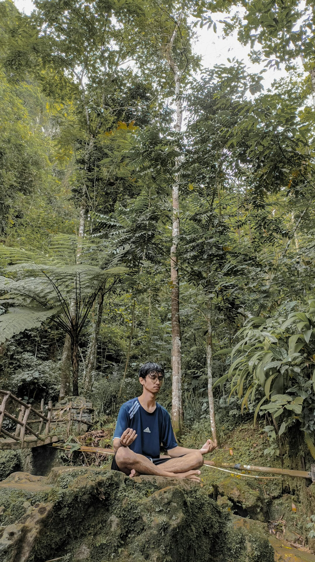 person meditating in nature